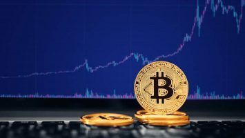Bitcoin on computer background