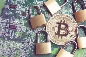 bitcoin security concept. Gold coin with padlock.