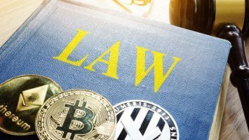 Crypto regulation. Cryptocurrency coins and book Law.