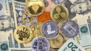 Bitcoin, Litecoin, Dash, Monero and Ethereum crypto currency coins over american USD dollars