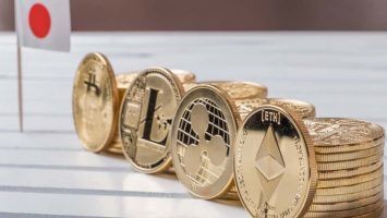 Popular cryptocurrency litecoin, bitcoin, ripple and ethereum with mini Japan flag